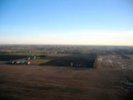 Rural Michigan from the air in the late afternoon.