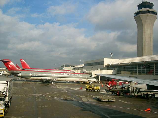 Planes wait at the gates outside a Detroit airport terminal on New Year's Eve, 2004.