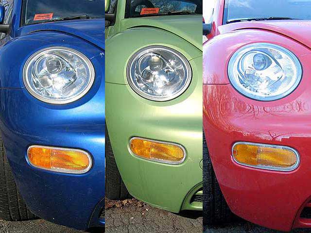 Three new VW Beetles recently parked on our street.