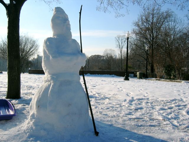 A zen master snowman meditates in what I believe is Walter Pierce Park off of Adams Mill Road in Adams Morgan.