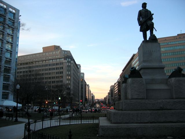 Looking up Connecticut Avenue from the middle of Farragut Square near dusk.