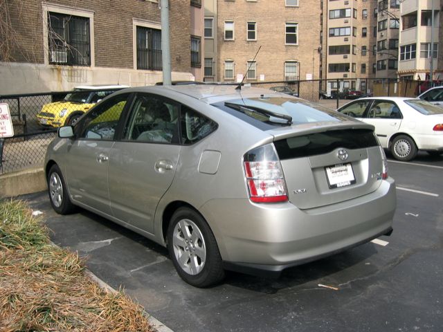 A new Toyota Prius sitting in a parking lot along 19th St. NW