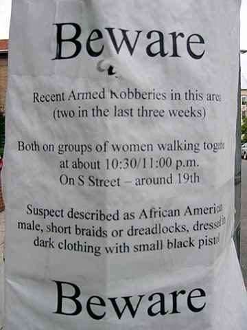 A sign posted in Dupont Circle neighborhood warning of a spike in crime