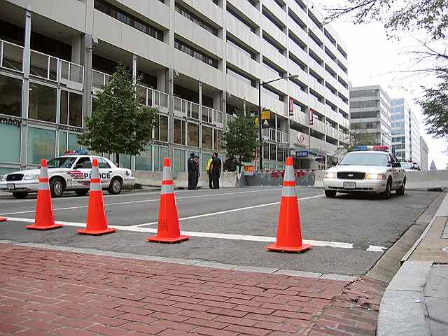 Police loiter around barricades near 20th and K. St.