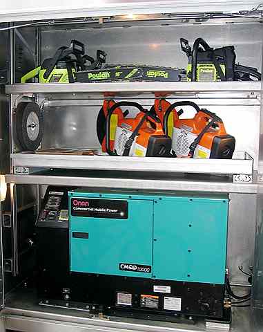 Chainsaws and disc saws sit at the ready in a D.C. Police truck.