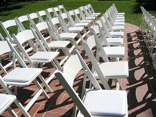 Empty rows of chairs await their occupants just before the wedding.