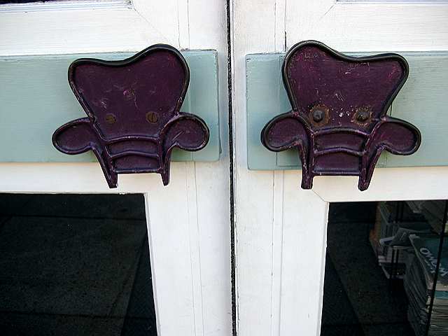 The door pulls on Tryst's front doors.