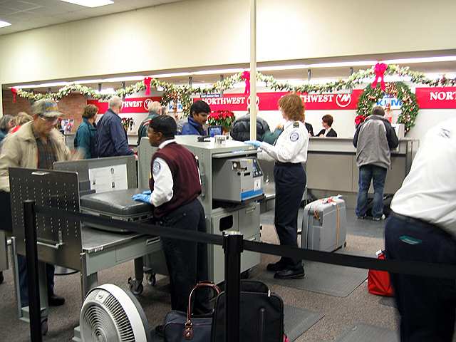 Transportation Safety Administration workers do their thing at a small Michigan airport.