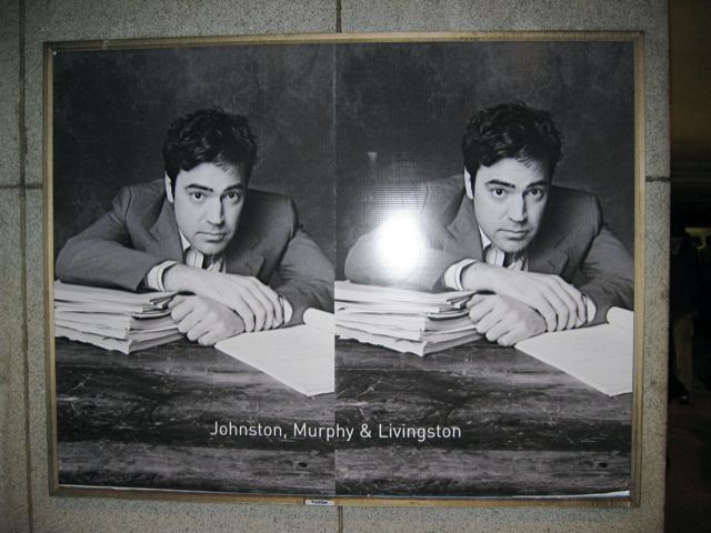 Large posters of Ron Livingston (and Ziggy Marley) decorate the Farragut North Metro Station.