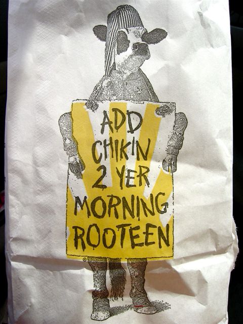 An ad on a Chick-fil-a bag encouraging you to eat more chikin.