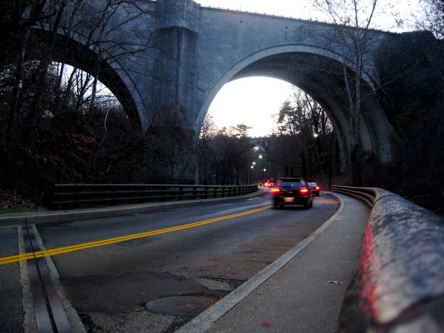 Looking down the bridge railing toward the Duke Ellington Bridge along Rock Creek Parkway.