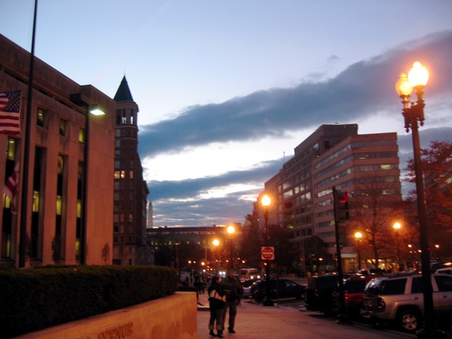 Clouds streak the sky at dusk in front of the D.C. Superior Court.