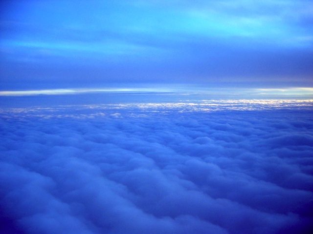 The setting sun gave the clouds a beautiful glow as I flew West on Christmas Eve.