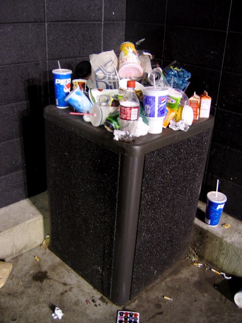 An overflowing trash can seemed a fitting symbol of post-Christmas America.