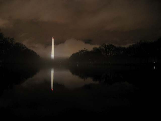 The Washington Monument in the early morning calm of the reflecting pool.