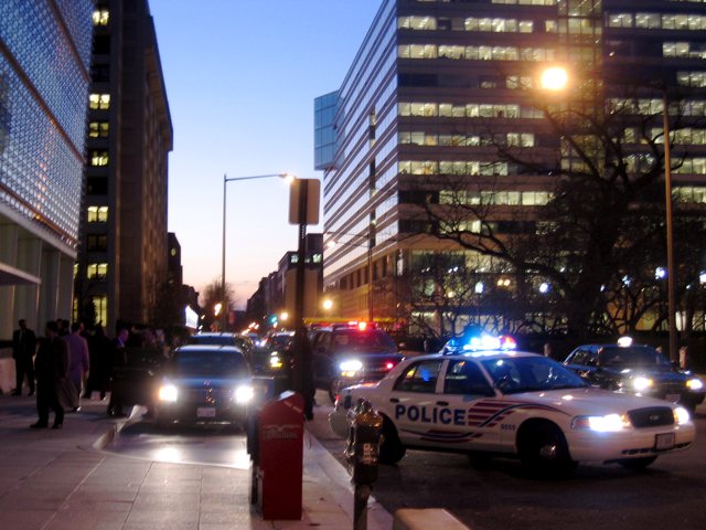 Some VIP getting out of a big fat (bulletproof?) limo in front of the World Bank.