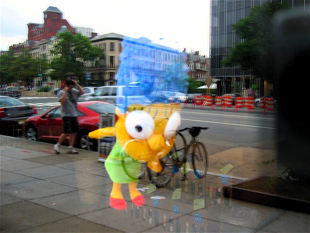 A stuffed Marge Simpson hangs in the window of Best Cellars in Dupont Circle.