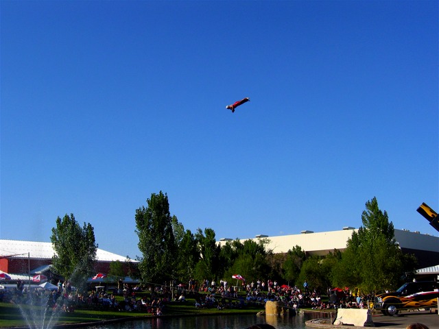 The Cannonball Lady in mid-flight from cannon to net.